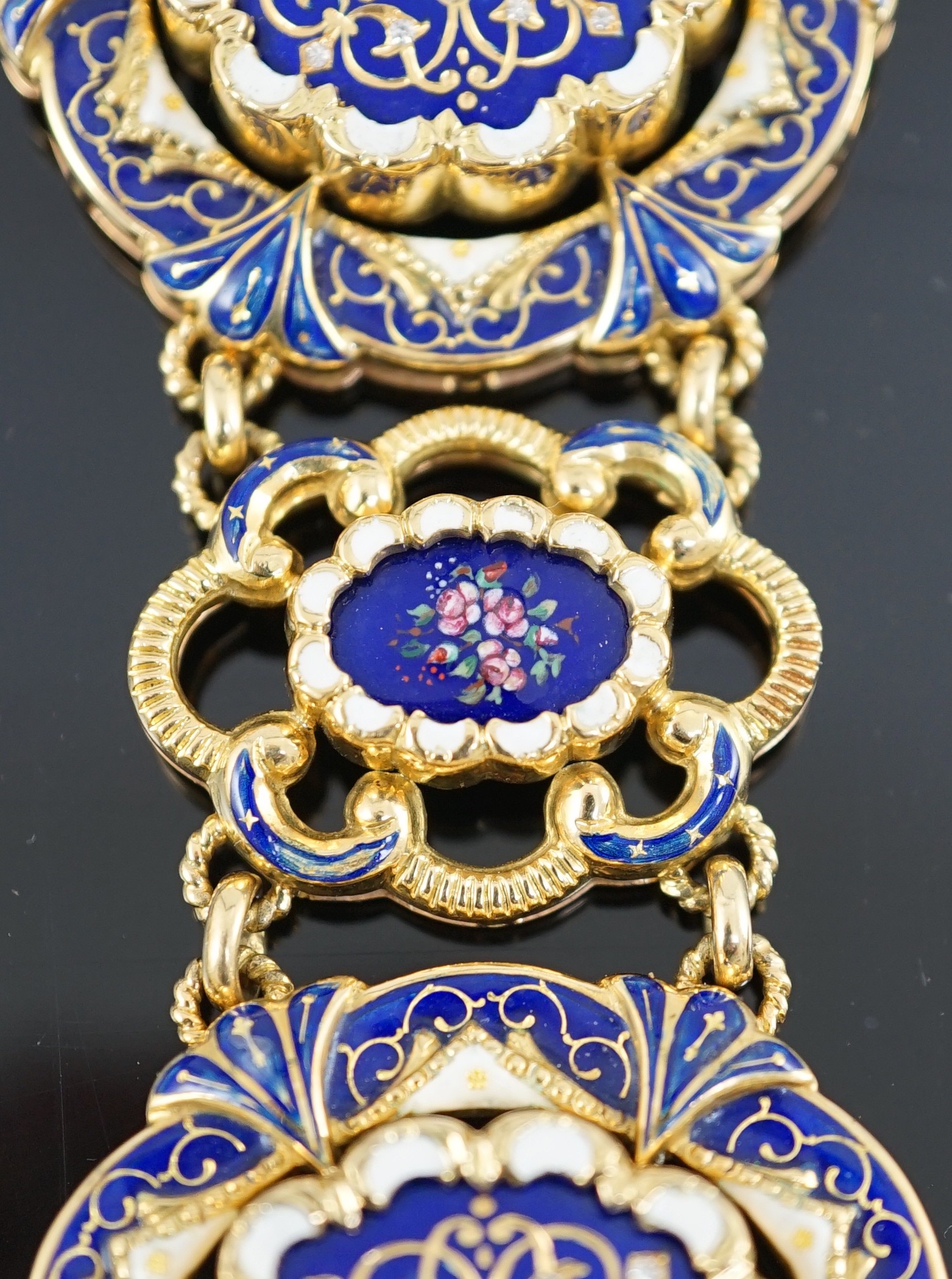 A late 19th century Swiss 18ct gold and polychrome enamelled suite of jewellery, retailed by E. Meister, Zurich